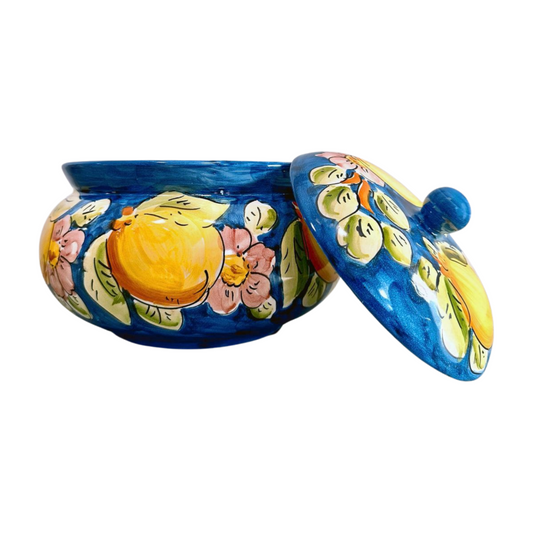 Italian Biscotti Jar in navy blue, featuring a flower and lemon design. Shown here with its lid off.