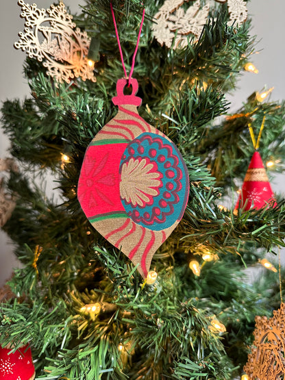 Wooden Bauble Ornament hanging on a Christmas tree.