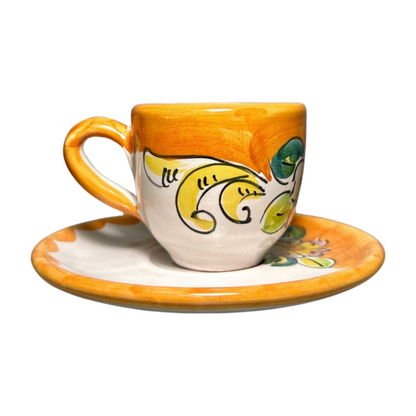 Side view of Italian espresso cup and saucer set, featuring a pink baroque flower design.