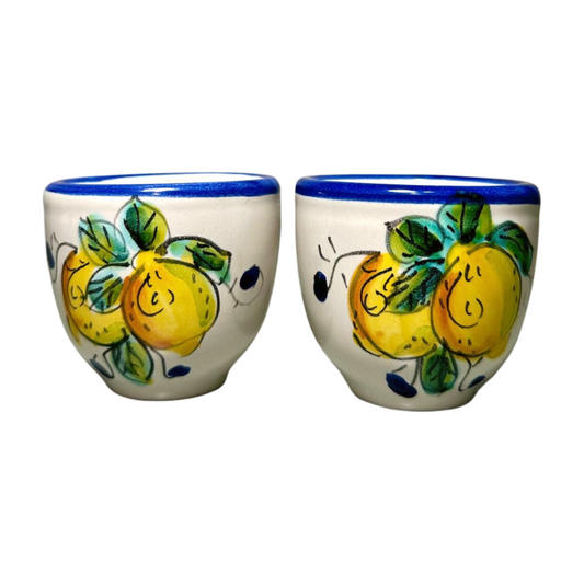 Italian espresso cups featuring a yellow lemon design with a blue rim and handle.