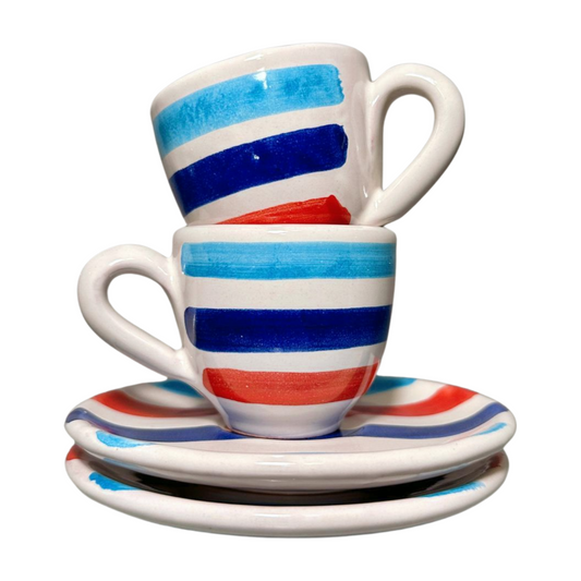 Set of two Italian espresso cups and saucers, featuring a modern blue and red stripe design. Shown here stacked.