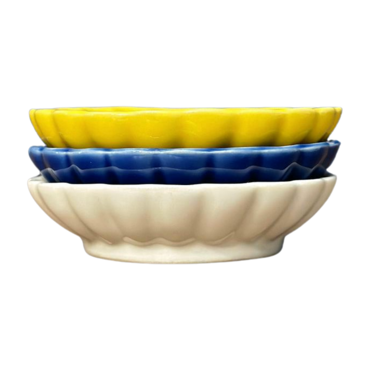 Set of three Japanese Sauce Plates in blue, yellow, and white. Pictured here stacked.