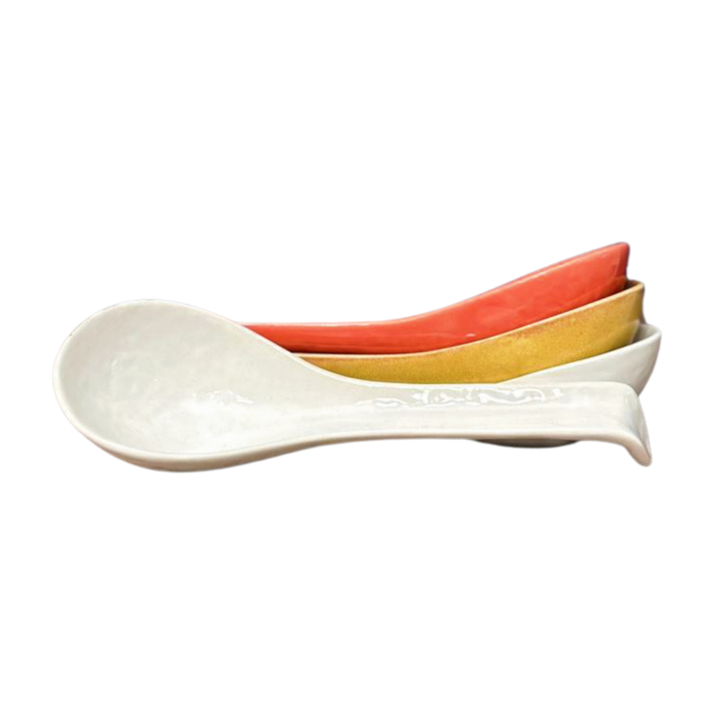 Set of stacked Japanese Soup Spoons in three colors: white, coral, and yellow.