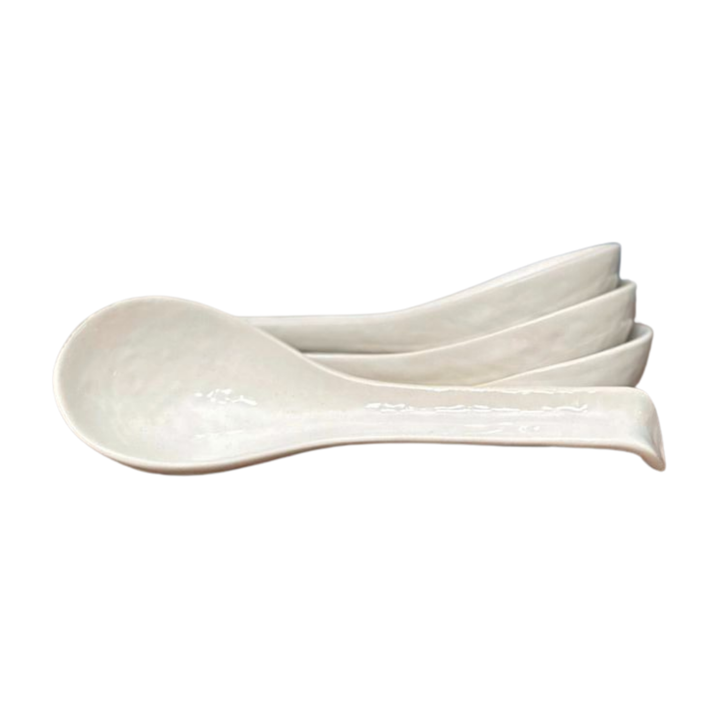 Set of stacked Japanese Soup Spoons in white.