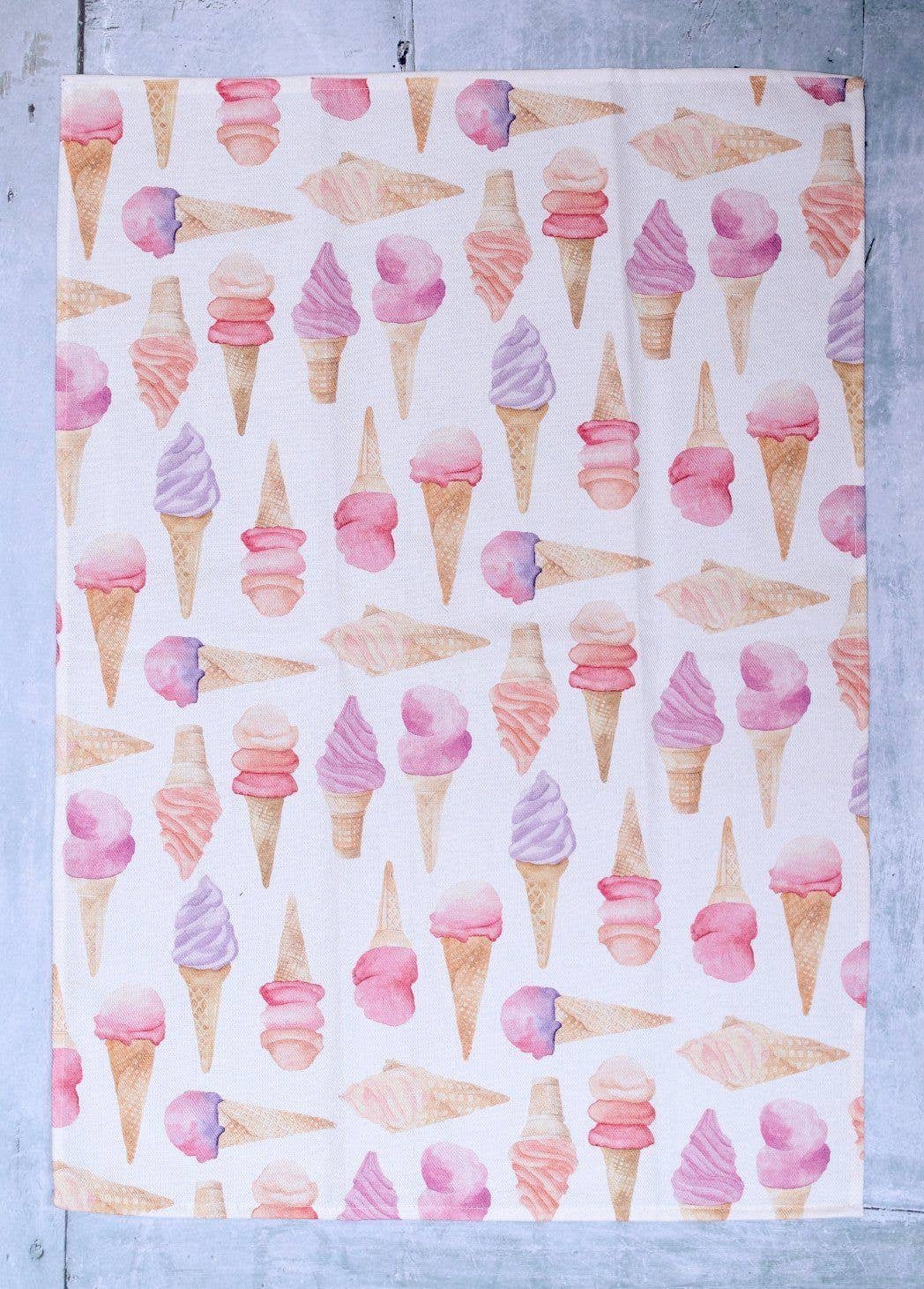 Another photo of the Ice Cream Kitchen Towel, featuring a pink and lavender ice cream cone design.